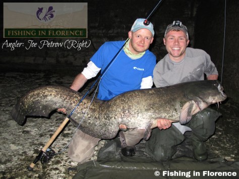 Joe Petrow with the potential world record (173 cm) Wels Catfish on the fly